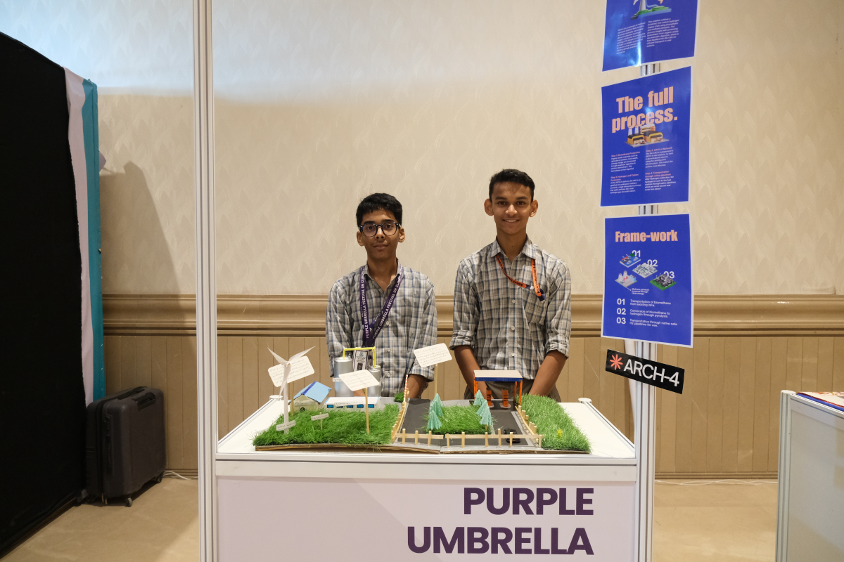 Students presenting a renewable energy model