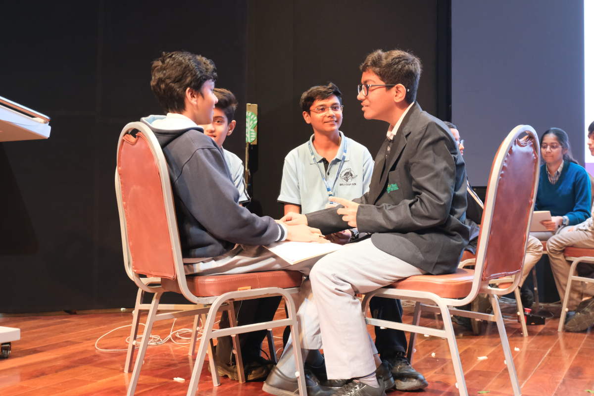 Students collaborating during the Climate and Heritage Quiz