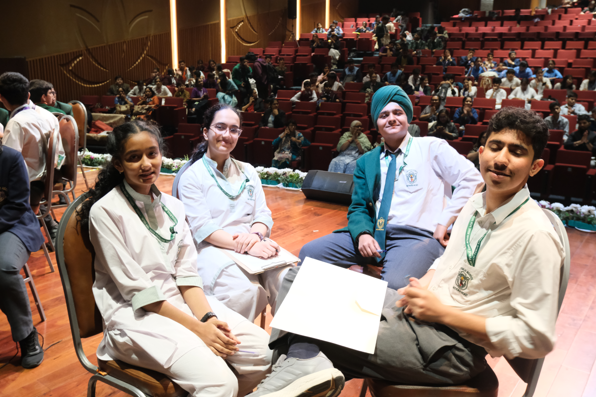 Students sharing ideas during a quiz round