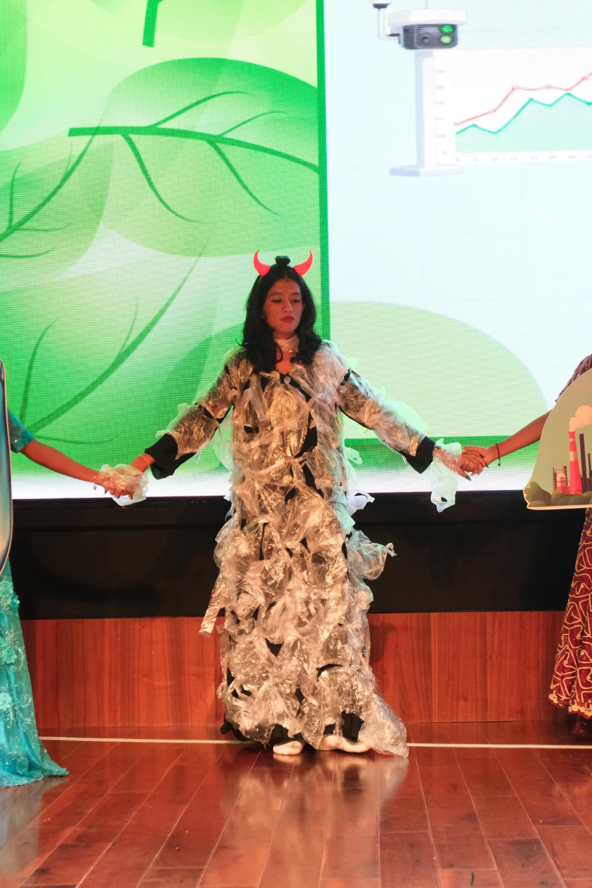 Young performer presenting a nature-inspired character